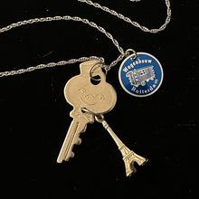 Load image into Gallery viewer, “KEY TO THE CITY” Handmade Charm Cluster Necklace Vintage American Tourister Key Advertising Tag &amp; Eiffel Tower Charm
